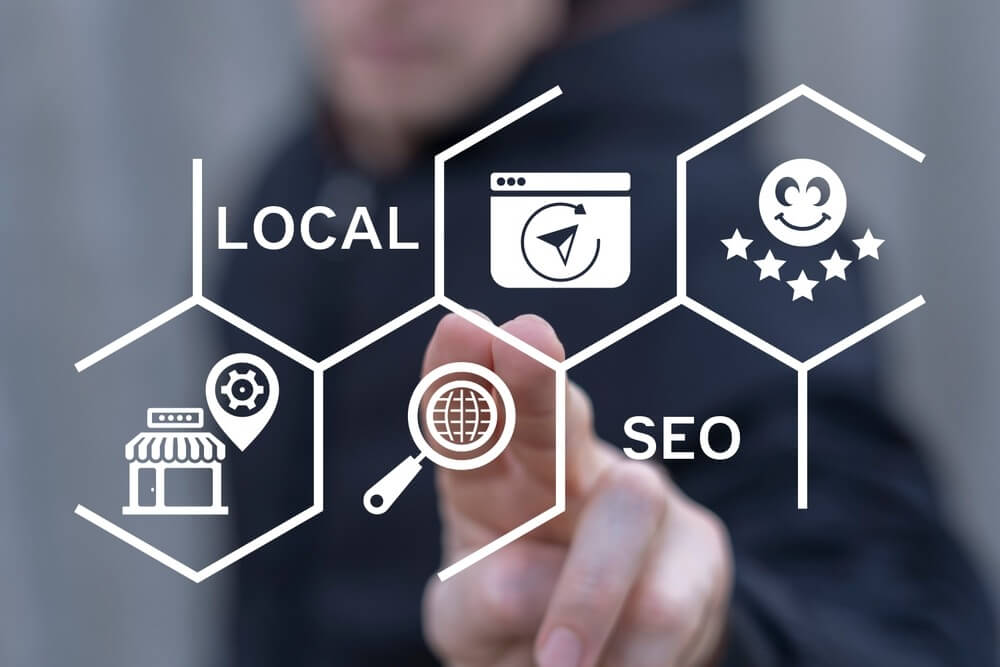 Person using virtual touch screen sees the inscription: LOCAL SEO.