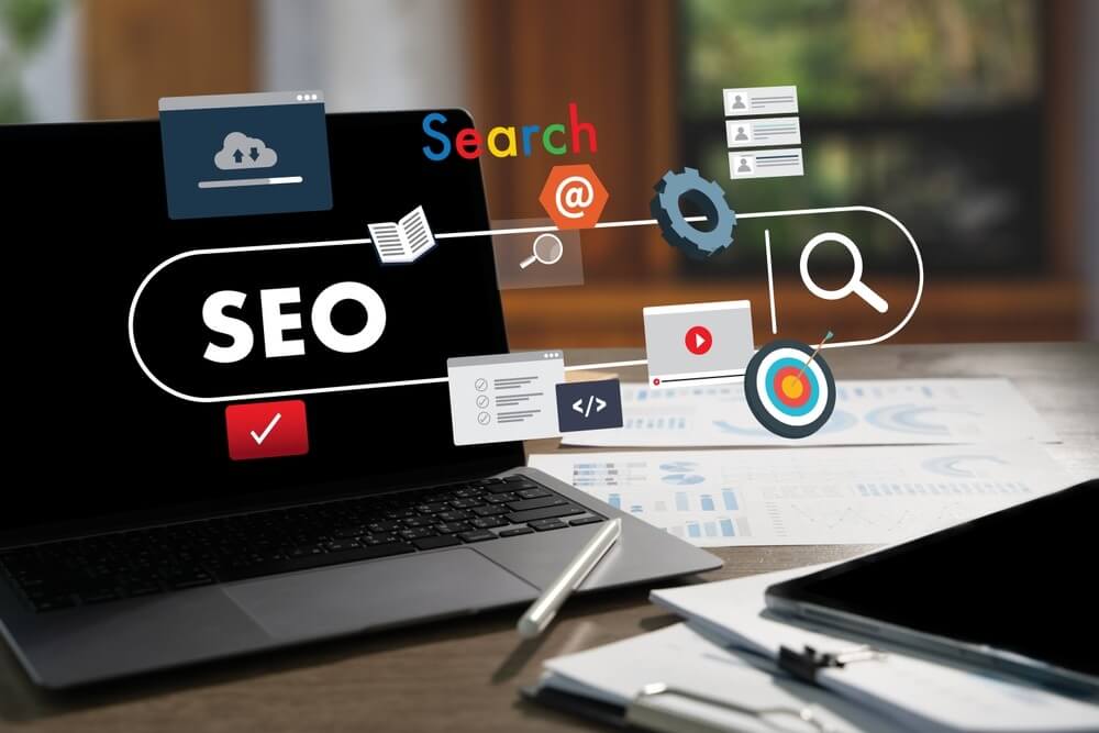Business showing Laptop and SEO Search Engine Optimization internet technology